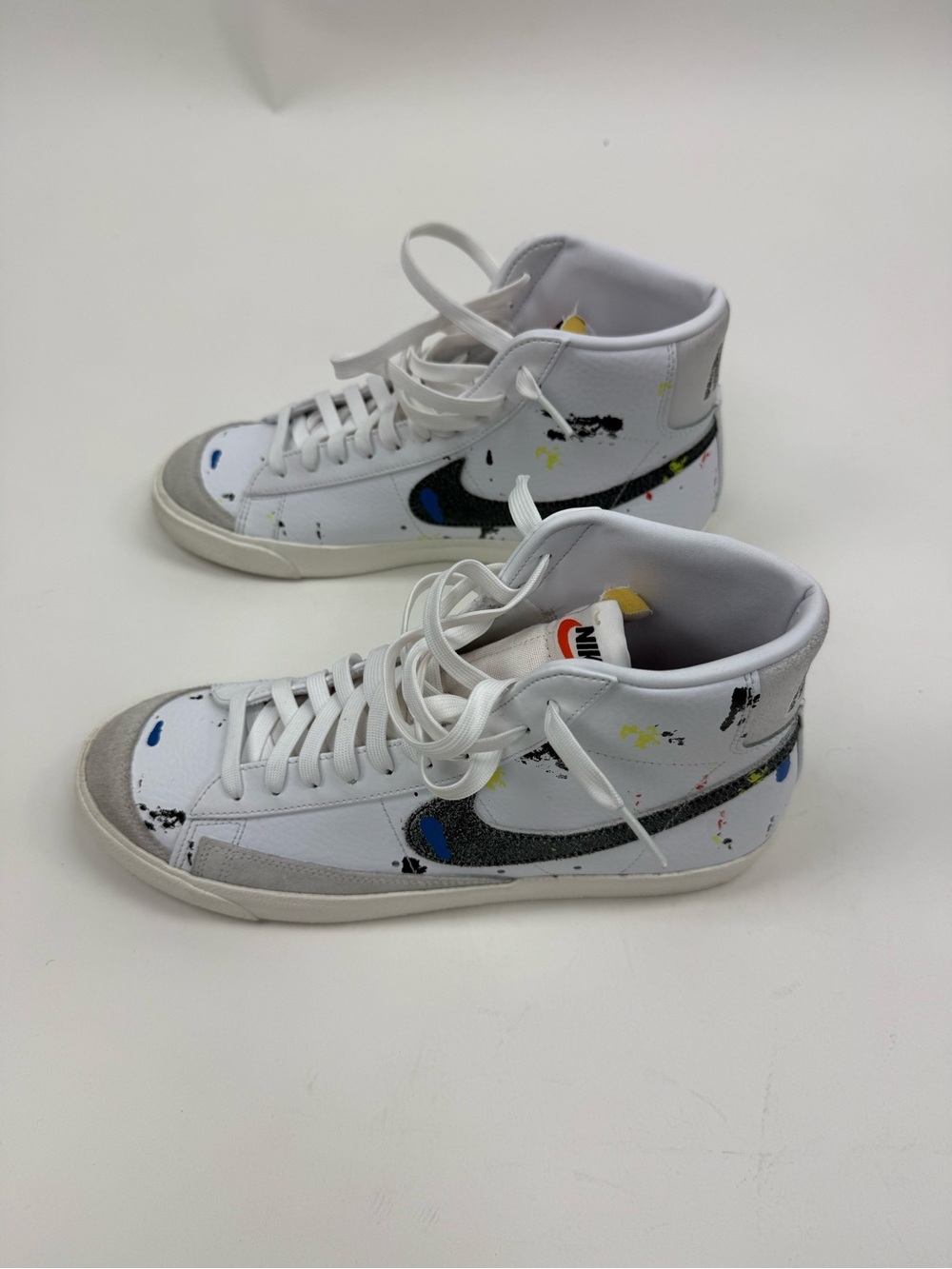Nike White High-Top Kids Sneakers with Multicolor Paint-Splatter Swoosh